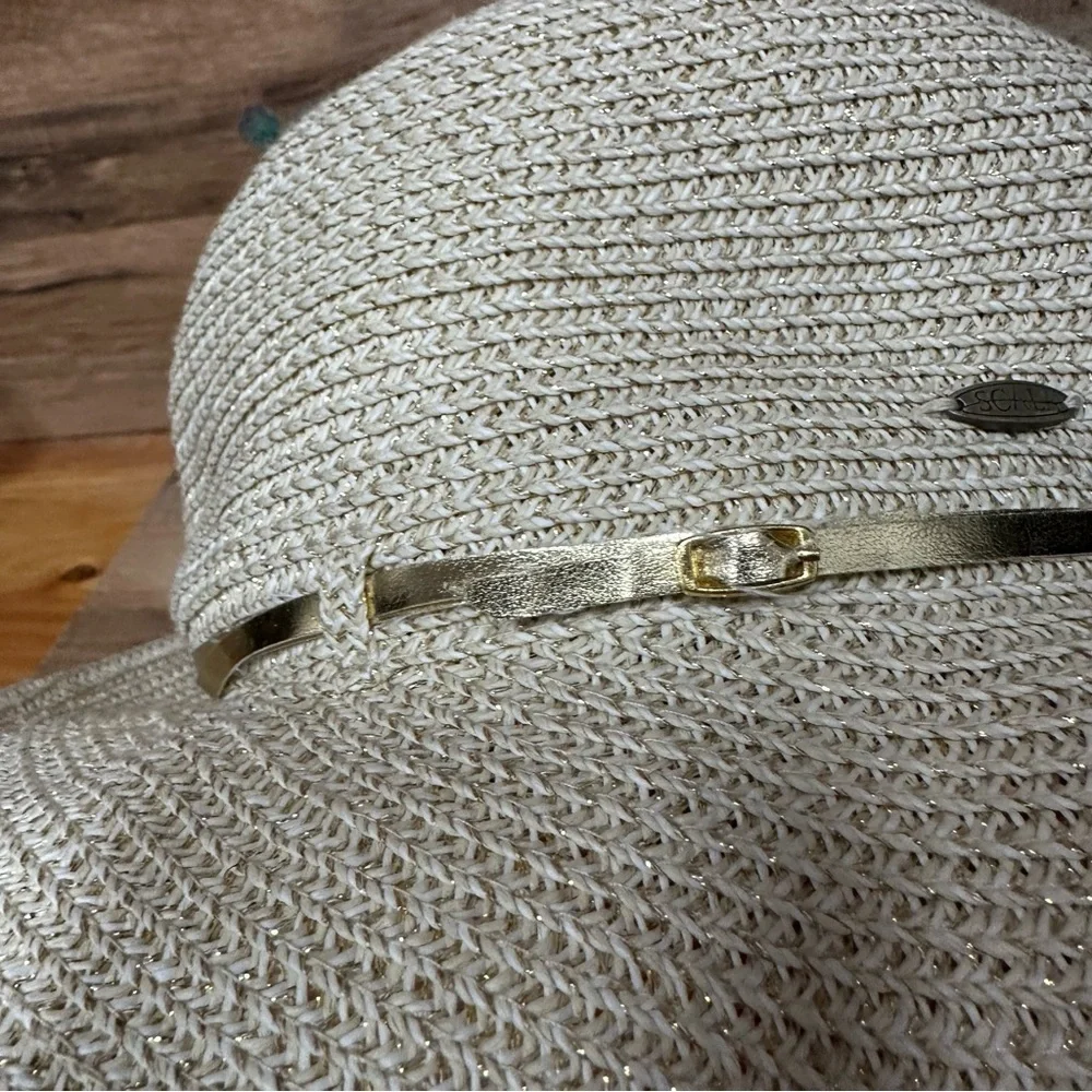 Scala women’s handwoven sun hat gold thread with a buckle trim